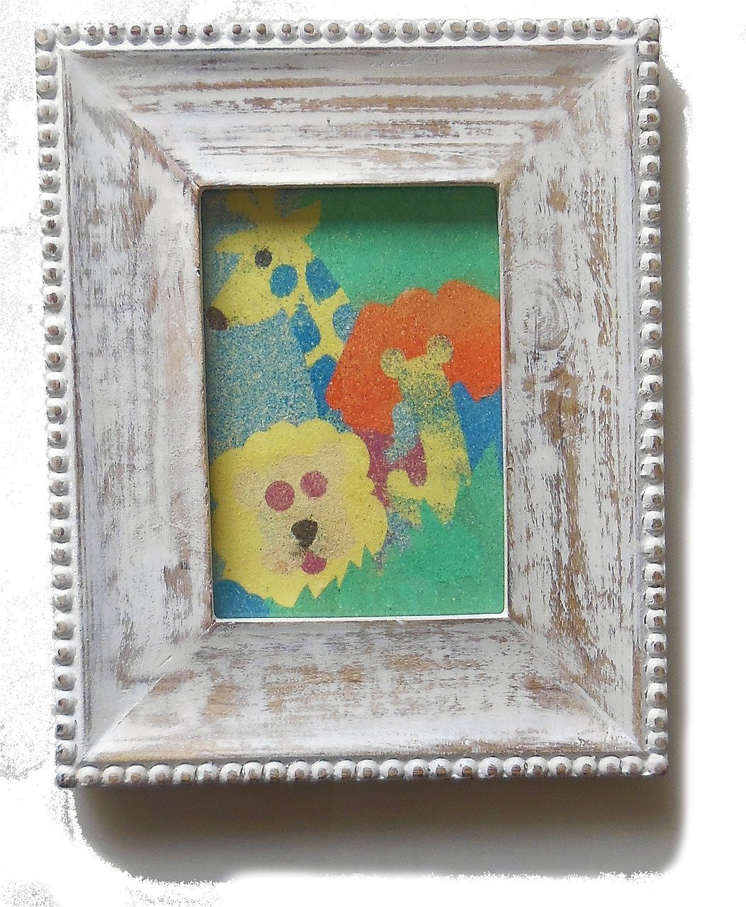 Children's colorful wild animals, sand art framed in wood.